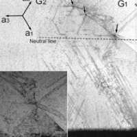 A study of dislocation transmission through a grain boundary in hcp Ti-6Al using micro-cantilevers